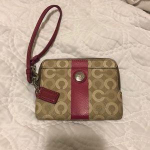Coach tan and pink wristlet clutch